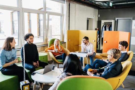 a group of people sitting in a room